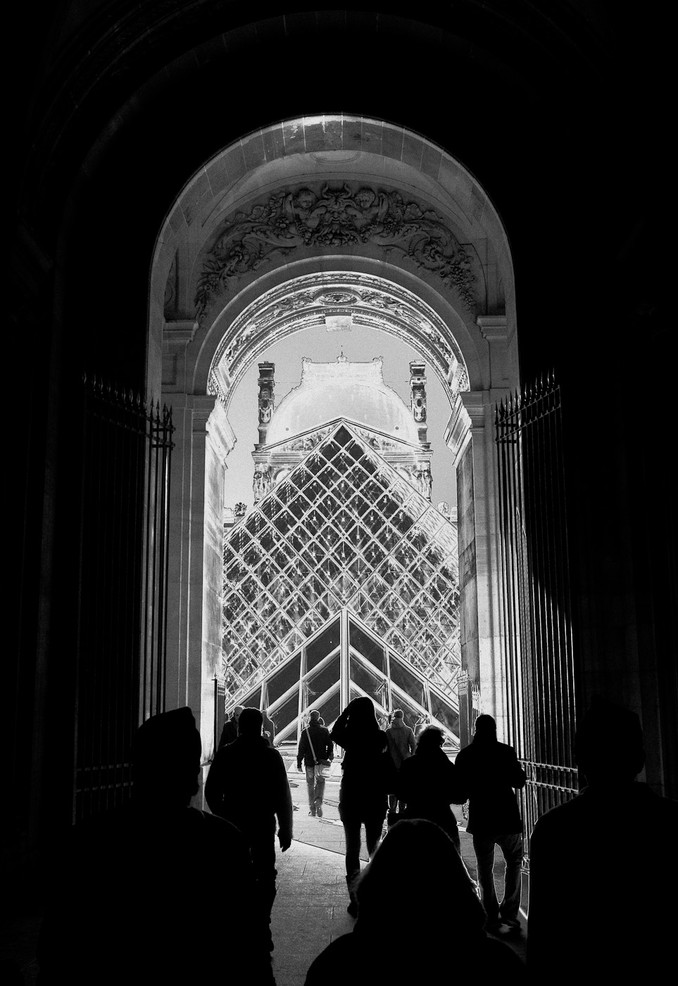 The passage towards the Louvre glass pyramid, solarized. Zeiss Biogon ZM 25/2.8 on SOny NEX-5n