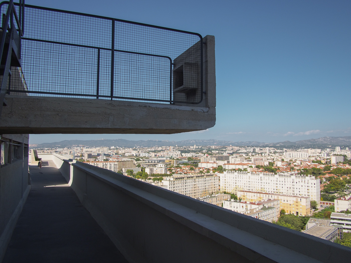 The top deck jutting out over Marseilles in La Cité Radieuse, by Le Corbusier. Olympus OM-D EM-5.